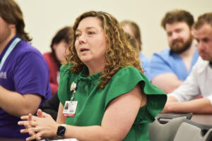 Erin Beth Hays, pharmacy specialist at UAMS North Central, asks Dr. Barnes a question.