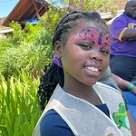 Melladee Joelle Thurman, 8, shows off her face paint at the NICU Reunion.
