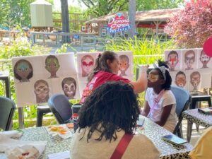 The face-painting station was very popular.