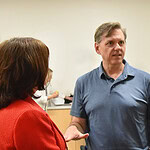 Timothy Abels, M.D., speaks to Dr. Barnes and Dr. Gardner