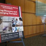 Photo of a sign announcing the Showcase of Medical Discoveries spotlighted drug discovery and emerging therapies at UAMS.