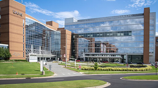 A picture of the exterior of the UAMS Medical Center and surrounding buildings.