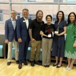 Sara Peeples, M.D., (second from right) was presented with the Willow Award: Excellence in End-of-Life Care. She was recognized by (from left) Howard Hurst, Jeff Smith, Mason and Samantha Pennington, and Jodie McGinley.