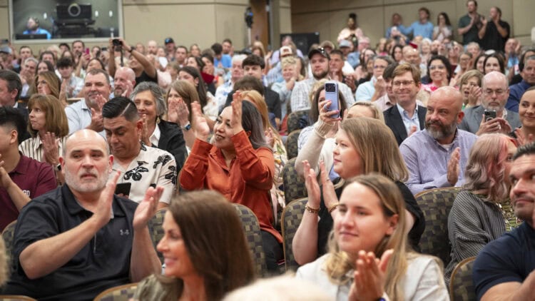 Family and friends of the students, applauding them at the conclusion of the ceremony, filled nearly every seat in Smith Auditorium.