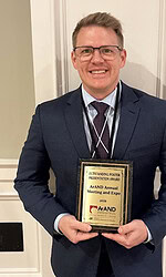Student Christopher Mayfield won the Outstanding Poster Presentation award.