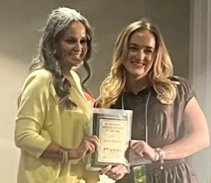 Sydney Gambelin, right, receives the Outstanding Dietetic Student of the Year award.
