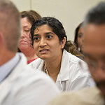 Kristina Patel, M.D., second-year resident, brings up the lack of psychiatric care for the clinic.