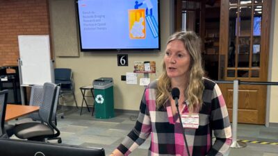 Samantha Kendrick, Ph.D., gives an overview of the workshop and its goals to the students and faculty in attendance.