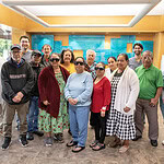 Jones Eye Institute doctors and Marshallese patients pose for a photo after the patients received cataract surgeries