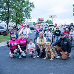 Staff from the UAMS Institute of Community Health Innovation poses with students and community members at the Walk and Roll to School event in May 2026.