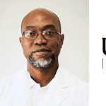 Photo of Dr. Jones with UAMS logo