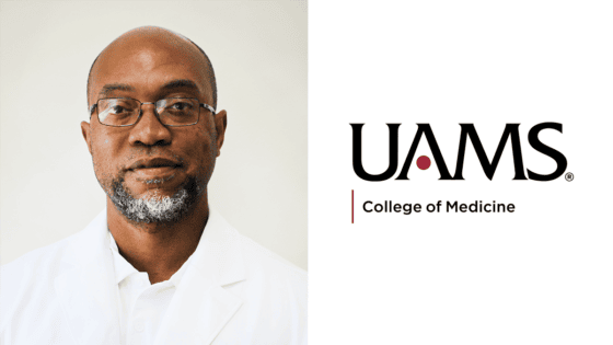 Photo of Dr. Jones with UAMS logo