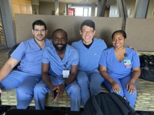 four new family medicine residents smiling at camera