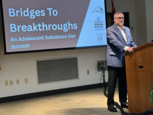 Jason Williams, Psy.D., MS.Ed., thanks the organizers and attendees of the summit for their belief in Arkansas’ young people.