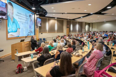 This photo shows some of the nearly 200 students and faculty members who attended the lecture, which was part of the College of Nursing’s fall orientation.