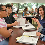 Student acts surprised at something Ana Sanchez is teaching them.