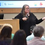 Amy Hester, an entrepreneur and adjunct faculty member in the UAMS College of Nursing, addresses the audience during her Aug. 17 lecture.