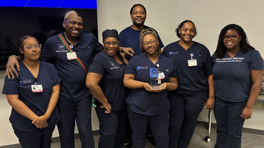 <p>Members of the University of Arkansas for Medical Sciences (UAMS) medline group pose after being presented with the Barbershop Talk Wellness Challenge trophy. They earned the award due to finishing at the top of the team rankings. Camille Hart, MPH, (far right) Barbershop Talk research program director is shown alongside the team. </p>
<div><a class="more" href="https://news.uams.edu/wellness-challenge-team/">Read more</a></div>