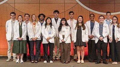 Pharmacy students in Little Rock who received research fellowship scholarships pose for a photo.