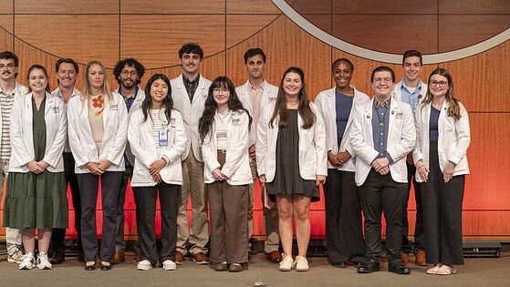 Pharmacy students in Little Rock who received research fellowship scholarships pose for a photo.