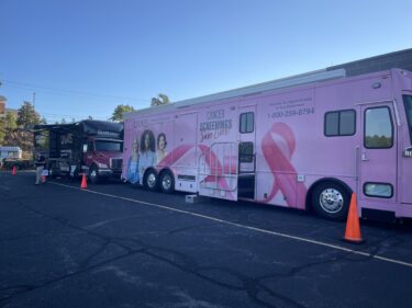 The UAMS MammoVan and the UAMS Winthrop P. Rockefeller Cancer Institute’s new lung cancer screening van were on hand to offer screenings for members of the community.