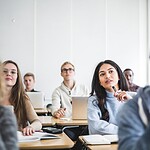 College students sitting in a classroom. The UAMS Psychiatric Research Institute is holding a free conference Oct. 24 aimed at introducing college students to the world of behavioral health careers.