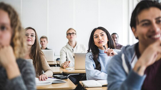 College students sitting in a classroom. The UAMS Psychiatric Research Institute is holding a free conference Oct. 24 aimed at introducing college students to the world of behavioral health careers.