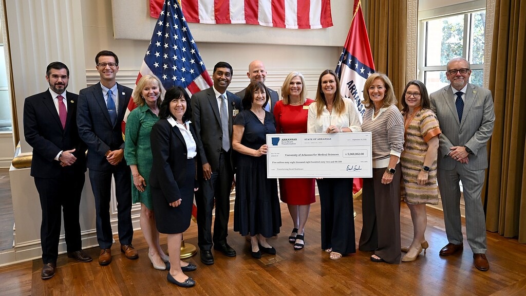 <p>Arkansas Gov. Sarah Sanders (center right) presents UAMS with a check in the second round of Rural Health Transformation Program (RHTP) grants.</p>
<div><a class="more" href="https://news.uams.edu/2026/09/24/arkansas-rural-health-transformation-program-awards-uams-5-million-to-fund-6-initiatives/uams-rhtp-group/">Read more</a></div>