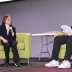Jeanne Wei, executive director of the UAMS Donald W. Reynolds Institute on Aging, takes part in a discussion with KARK-TV’s Dylan Price at the 2026 Health & Wellness Expo.