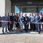 Harrison Reed and Chancellor C. Lowry Barnes, M.D., cut the ribbon to officially open UAMS Health's new hospital in Bryant.