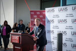 UAMS Chancellor C. Lowry Barnes, M.D., at the podium.