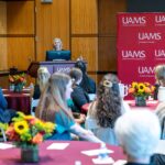 Sarah Rhoads, dean of the UAMS College of Nursing, addresses scholarship recipients and donors during the Sept. 22 reception.
