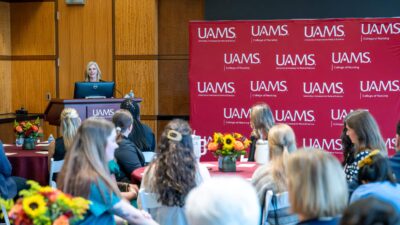 Sarah Rhoads, dean of the UAMS College of Nursing, addresses scholarship recipients and donors during the Sept. 22 reception.