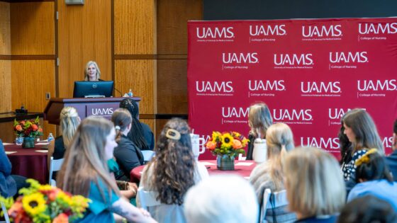 Sarah Rhoads, dean of the UAMS College of Nursing, addresses scholarship recipients and donors during the Sept. 22 reception.