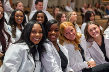 Several students from the UAMS College of Nursing pose for a group photo.