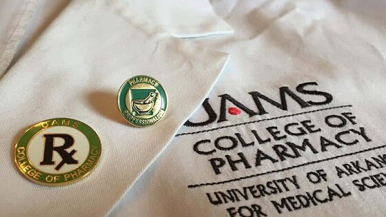 UAMS College of Pharmacy coat and pin