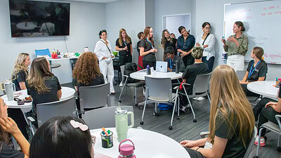 Board members from Members of the Every Mother Counts Board of Directors visit with members of the University of Arkansas for Medical Sciences (UAMS) Institute for Community Health Innovation and Ignite Professional Studies.