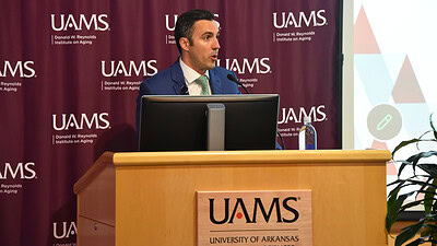 Marcelo Bigarella, M.D., urologic oncologist and assistant professor in the UAMS College of Medicine’s Department of Urology, speaks at the Geriatrics Updates conference in the UAMS Donald W. Reynolds Institute on Aging.