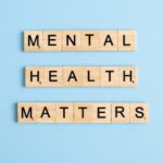 Scrabble tiles spelling out "Mental Health Matters."