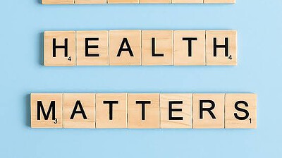 Scrabble tiles spelling out "Mental Health Matters."