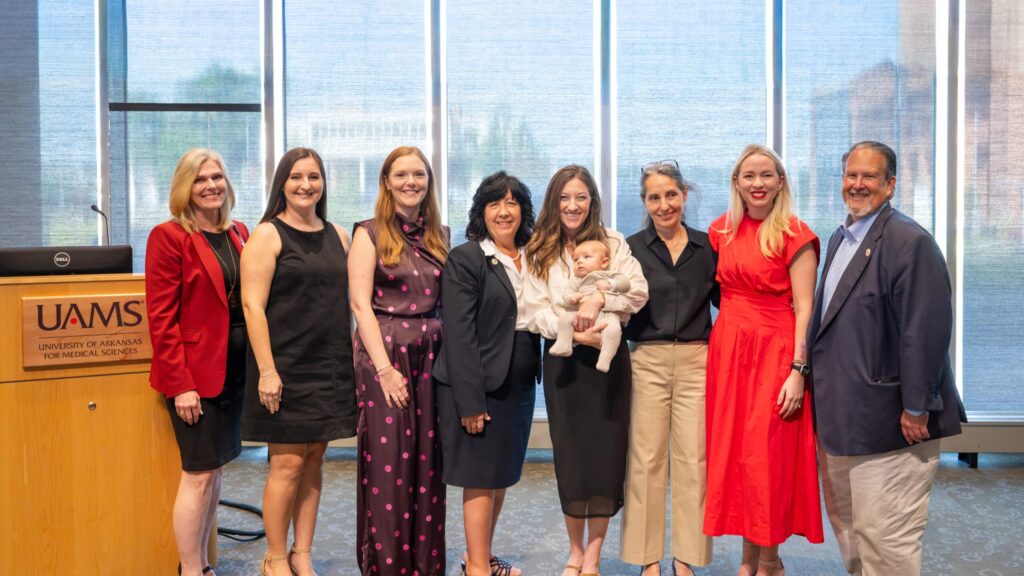<p>Sarah Rhoads (from left), dean of the UAMS College of Nursing, stands with nurse-midwifery students Sidney Foust and Miranda Hays, Arkansas Rep. Mary Bentley, Nurse-Midwifery Program Director Samantha Crouch, program Assistant Director Dominique DuBois, UAMS nurse-midwife Shalyn Calaway, and Arkansas Rep. Howard Beaty Jr. after a news conference to recognize nurse-midwifery students as well as the Arkansas Legislature’s efforts to expand nurse-midwifery care throughout the state.</p>
<div><a class="more" href="https://news.uams.edu/2026/10/14/uams-college-of-nursing-welcomes-inaugural-cohort-of-states-first-nurse-midwifery-program/midwifery-press-conf-10142026-bcz_6818/">Read more</a></div>