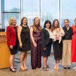 Sarah Rhoads (from left), dean of the UAMS College of Nursing, stands with nurse-midwifery students Sidney Foust and Miranda Hays, Arkansas Rep. Mary Bentley, Nurse-Midwifery Program Director Samantha Crouch, program Assistant Director Dominique DuBois, UAMS nurse-midwife Shalyn Calaway, and Arkansas Rep. Howard Beaty Jr. after a news conference to recognize nurse-midwifery students as well as the Arkansas Legislature’s efforts to expand nurse-midwifery care throughout the state.