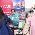 Members of UAMS North Central Regional Campus talk with medical students